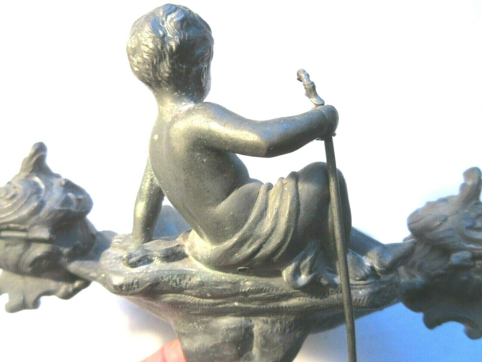 Double ink out 19th in tin signed J. GARNIER: The Cherub fisherman