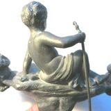 Double ink out 19th in tin signed J. GARNIER: The Cherub fisherman