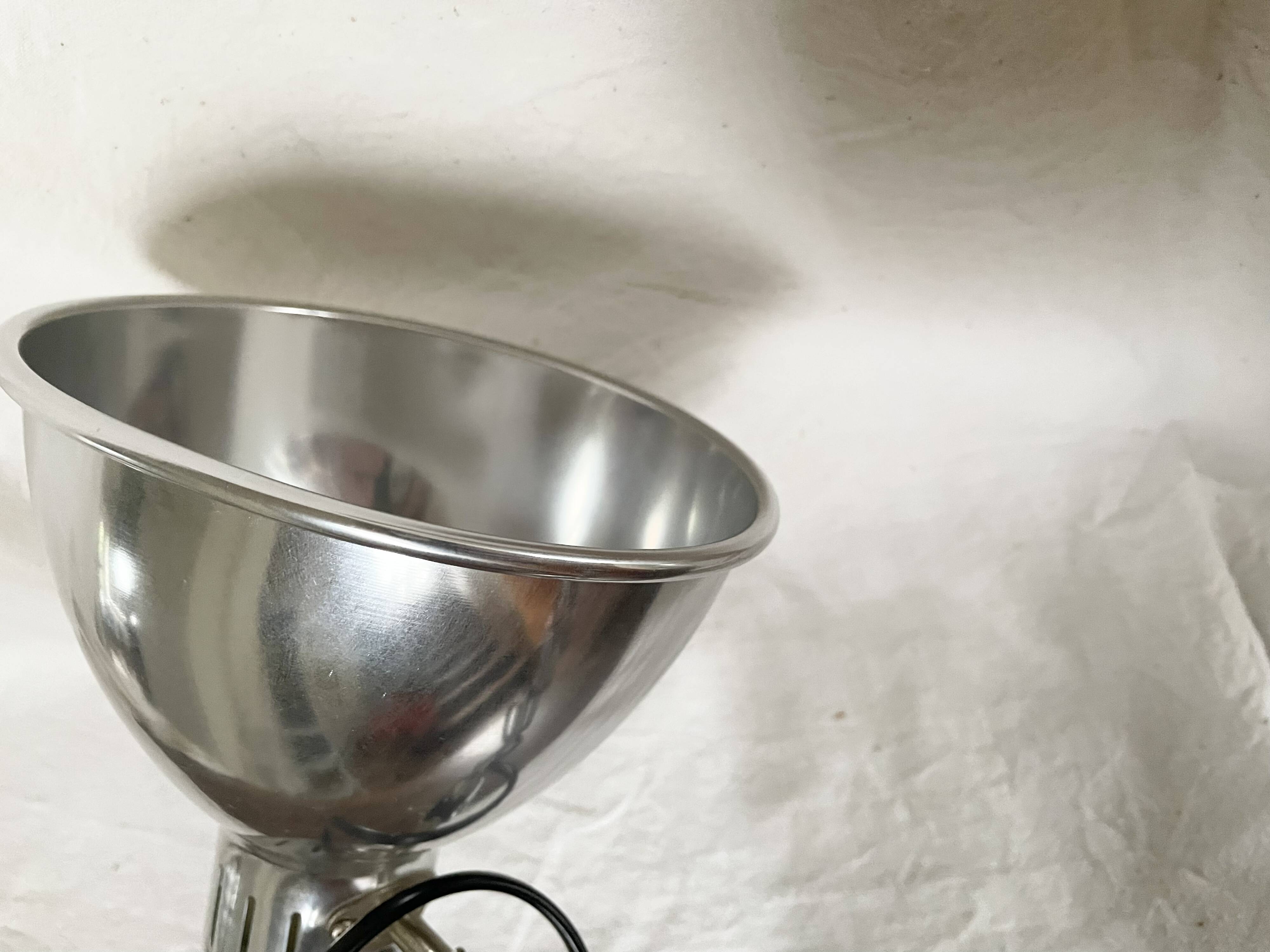 Vintage accordion wall light in chrome metal.