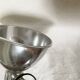 Vintage accordion wall light in chrome metal.