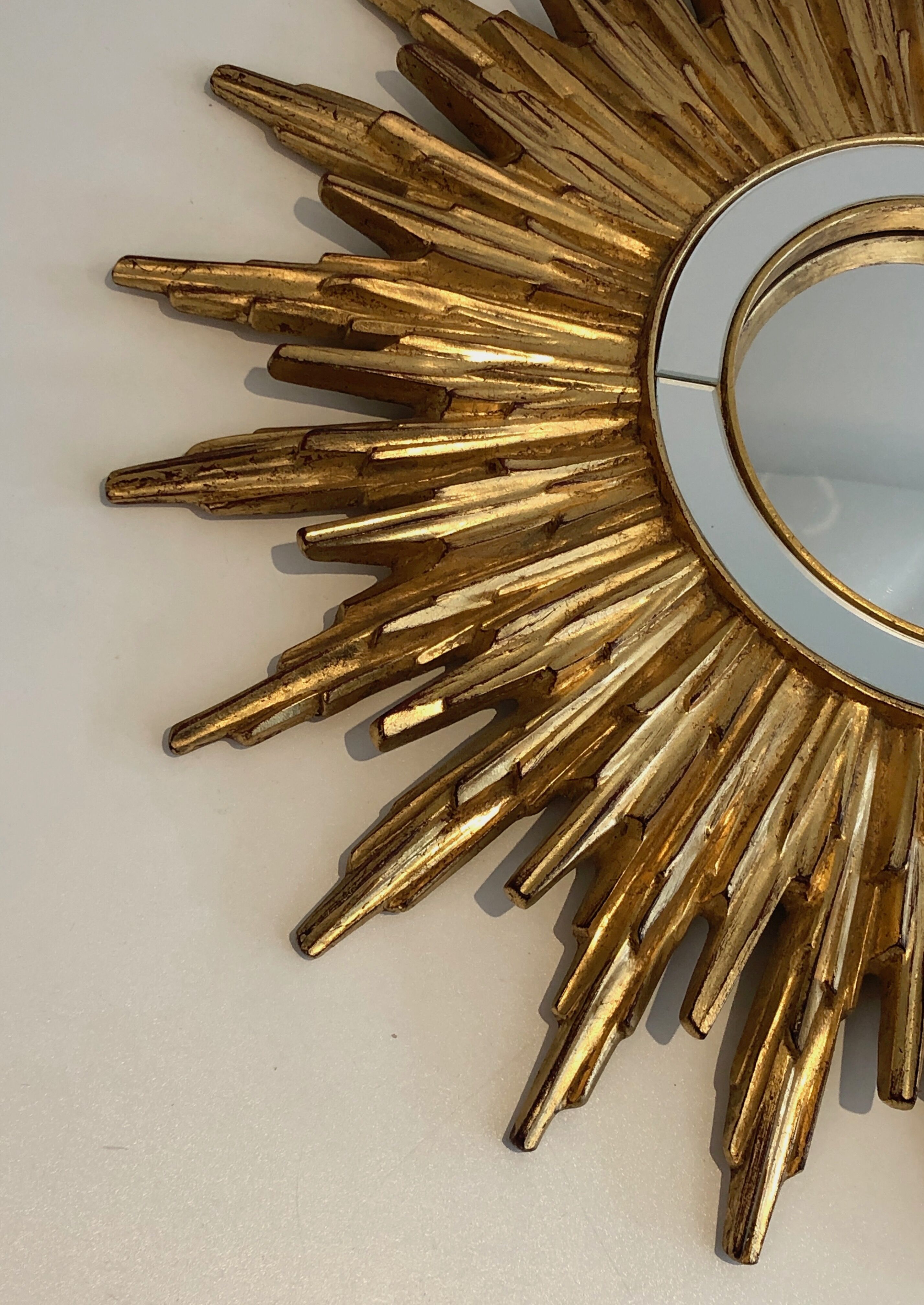 Sun mirror in golden resin 50cm