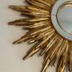 Sun mirror in golden resin 50cm