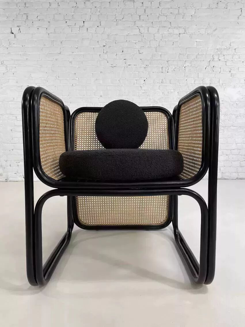 Cubic armchair in black rattan and canework