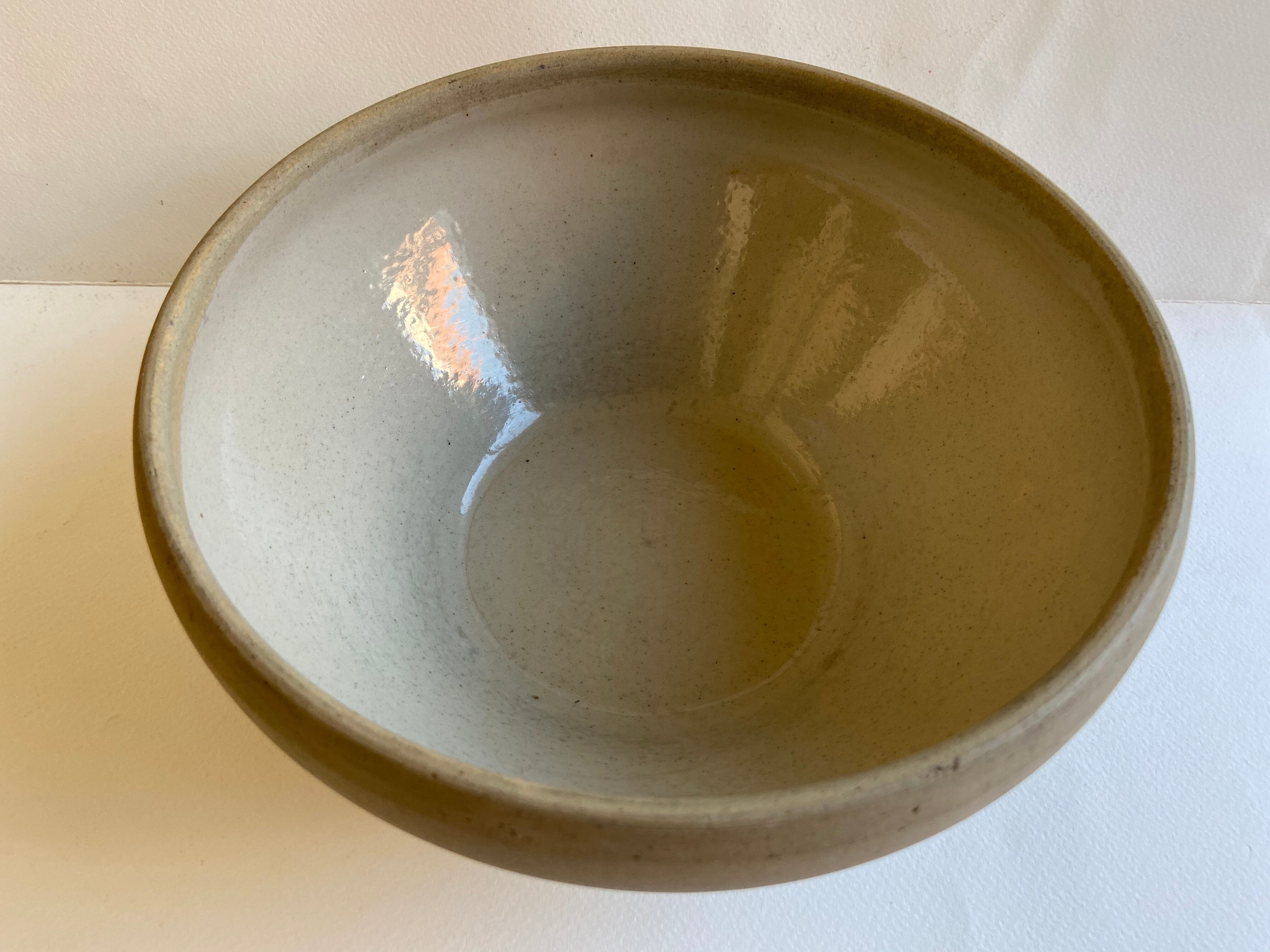 Pair of enamelled sandstone bowls