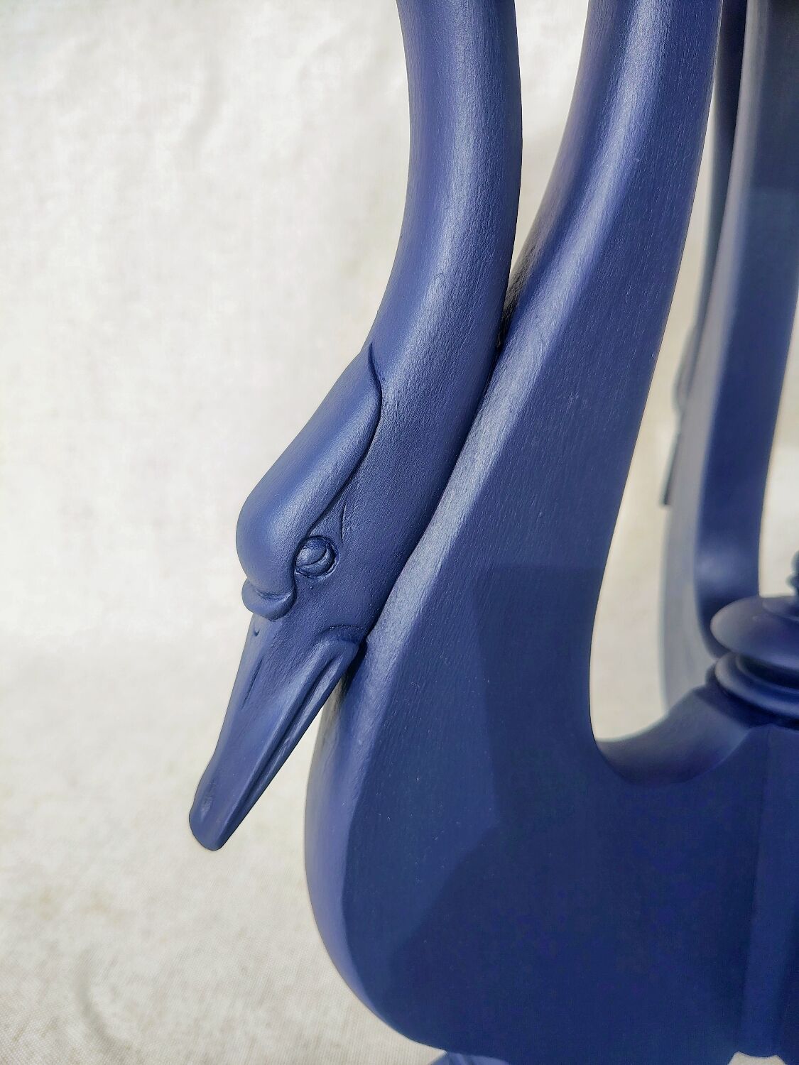 Side table with swan legs