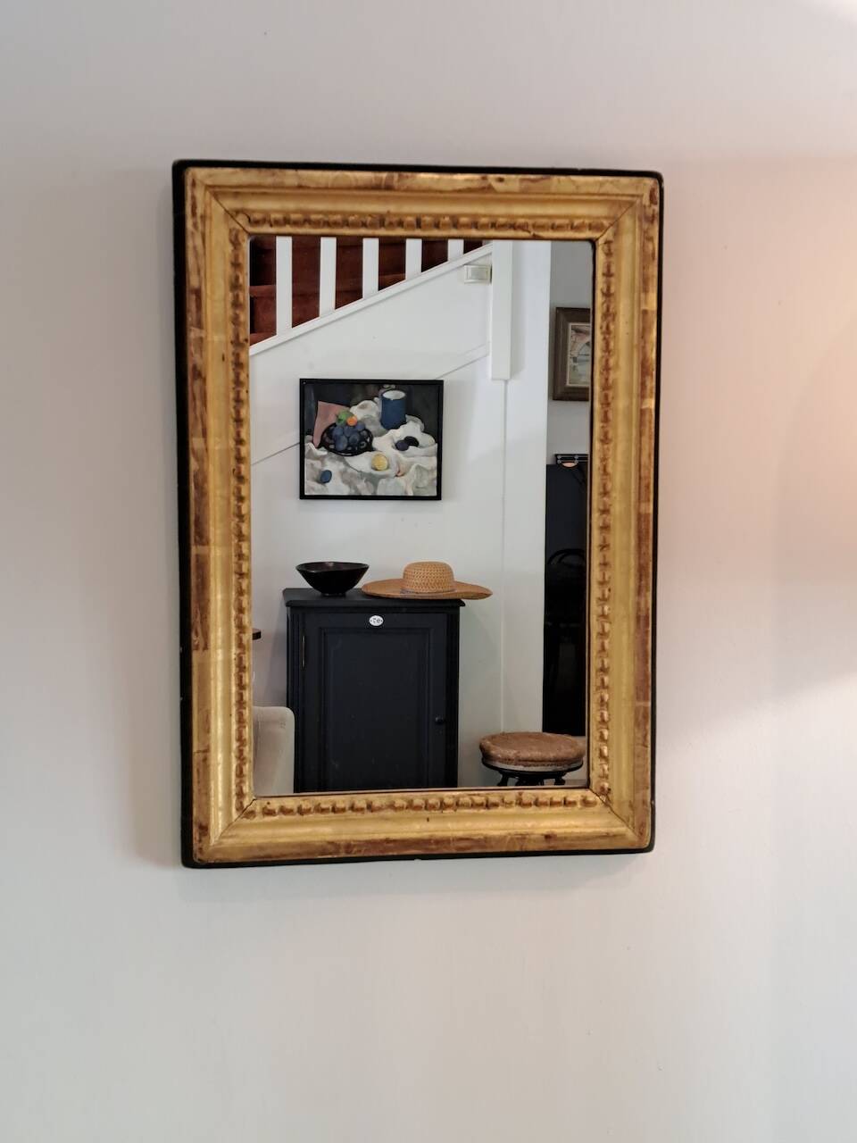 Antique mirror in wood and gilded stucco