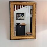 Miroir ancien en bois et stuc doré