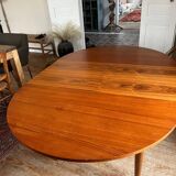 Scandinavian round teak table with butterfly extensions from the 60s