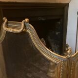 Old brass fire shield