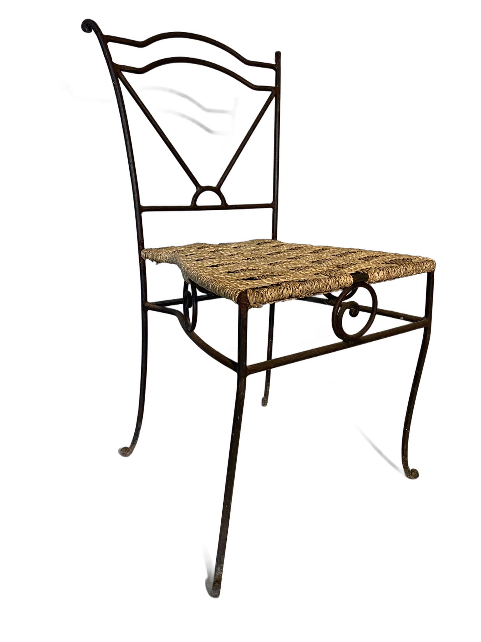 Wrought iron chair with woven seat