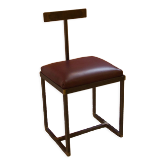 Chaise basse en cuir et acier