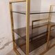 Brass shelf, smoked glass