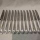 12 silver-plated table knives by Ercuis Valencay, 25cm
