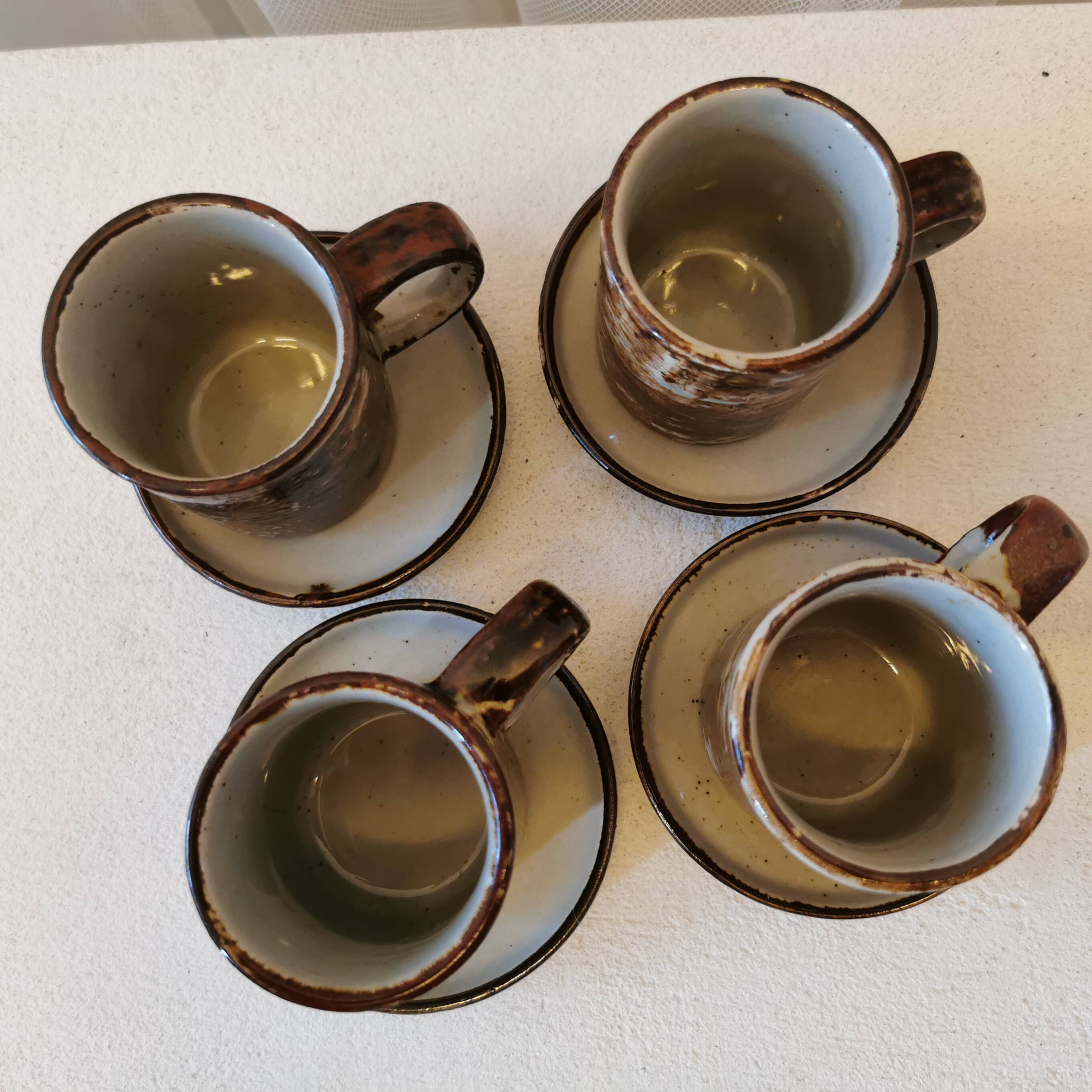 Set of 4 coffee cups and saucers