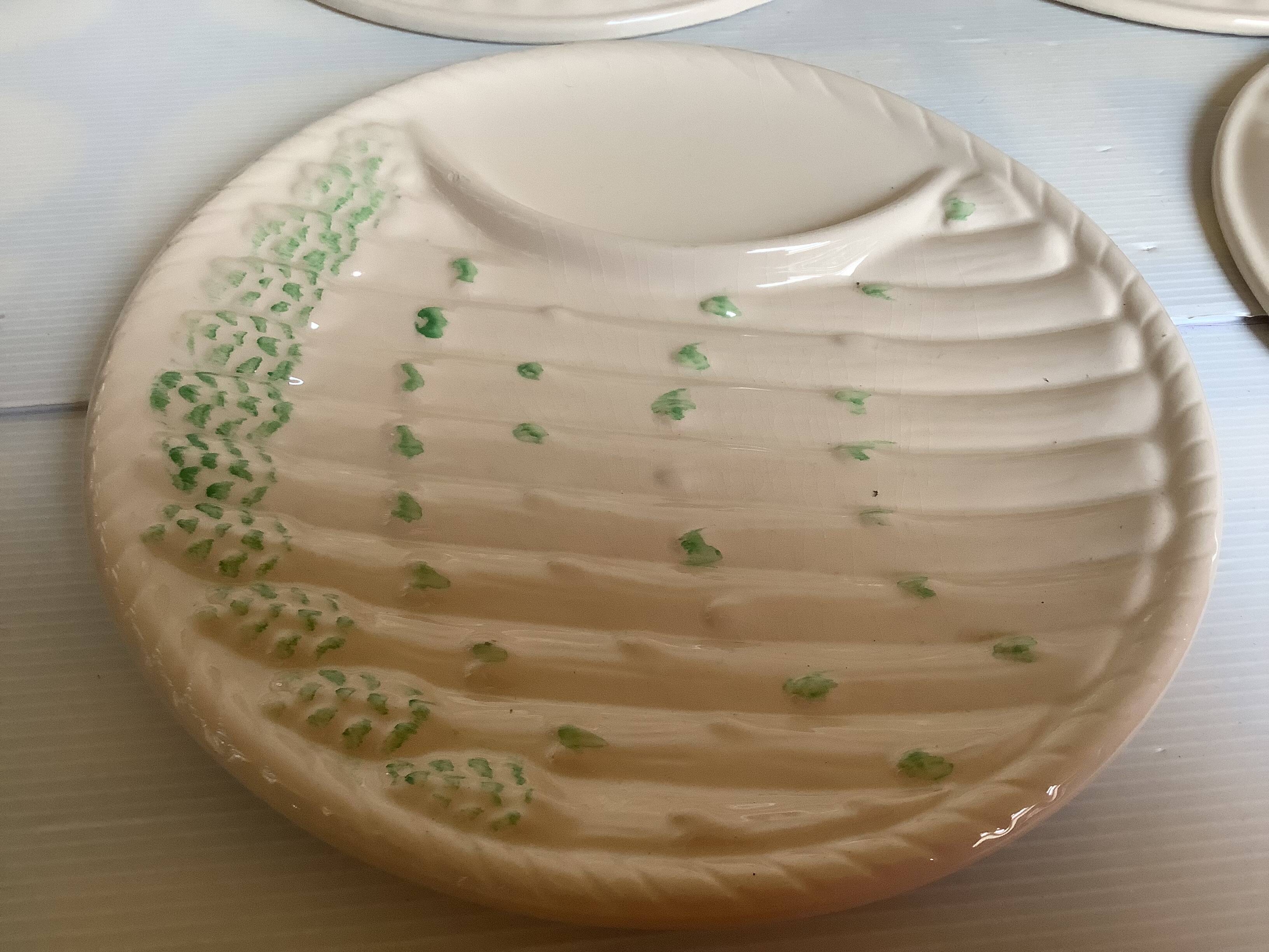 Six antique asparagus plates