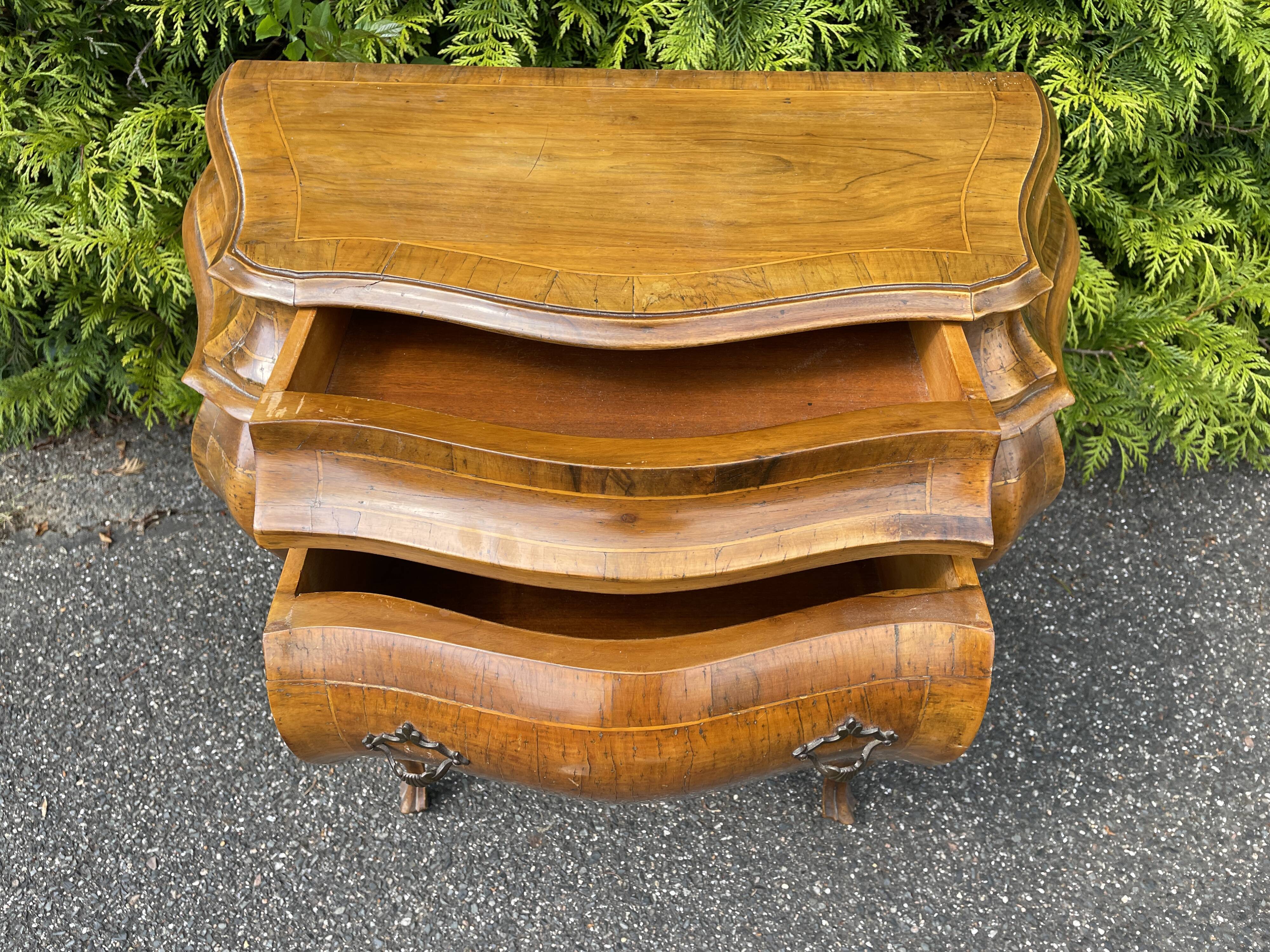 Chest of drawers in Dutch style marquetry with secret drawer.