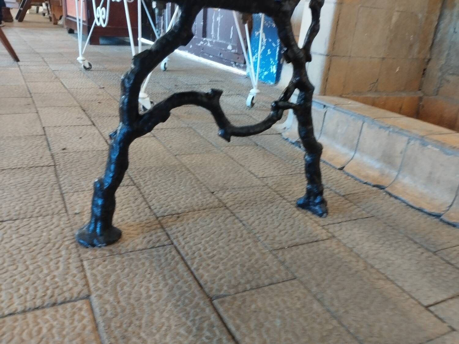 Antique garden bench with cast iron legs