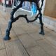 Antique garden bench with cast iron legs