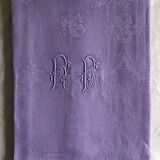 Old damask tablecloth in linen and purple silk