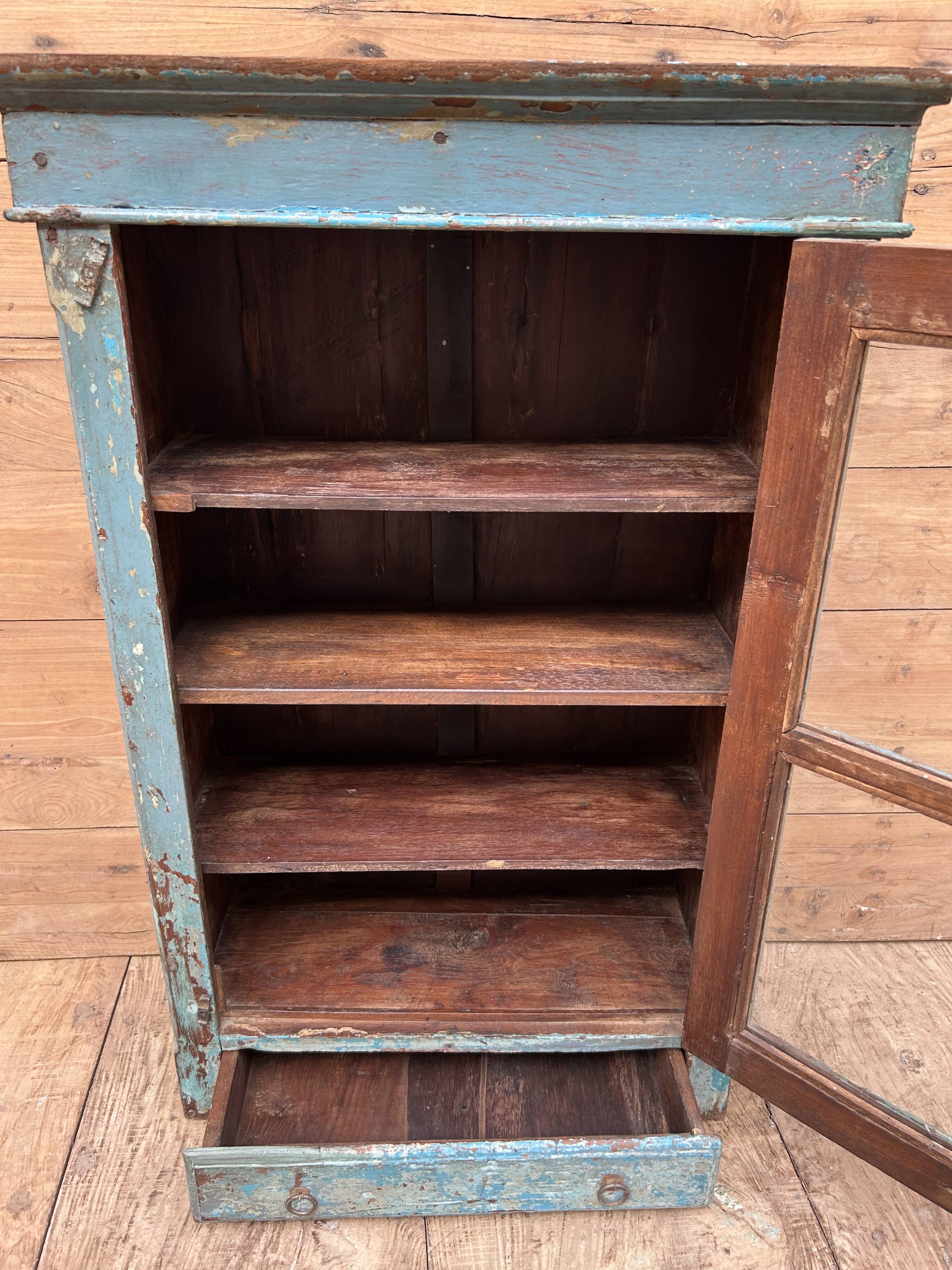 Wall display cabinet in Burmese teak with original patina.
