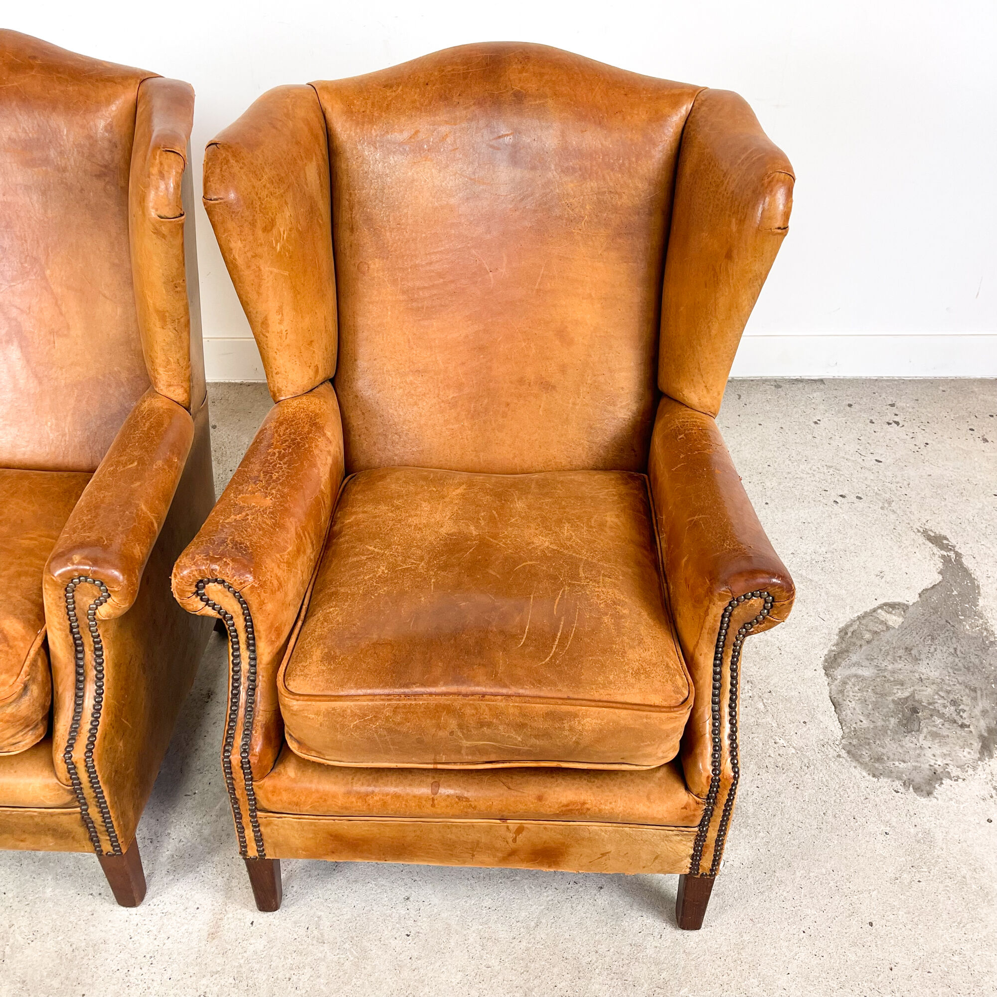 Set of two sheep leather wingback armchairs Delft