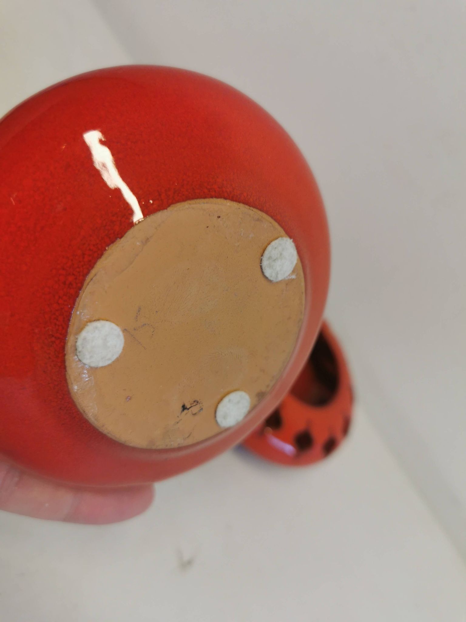 Pair of candle holders from the 1960s-1970s, crafted in red ceramic