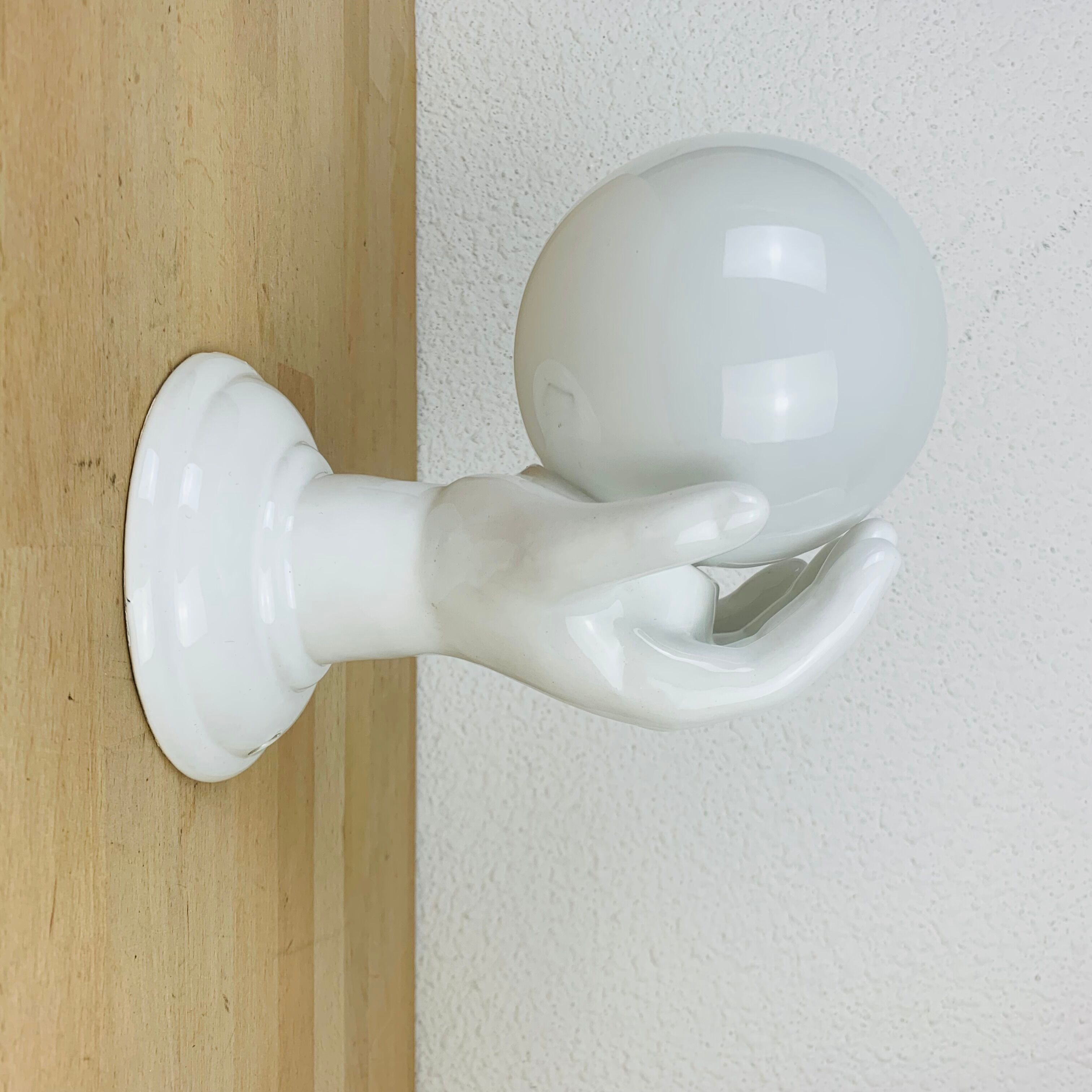 White and opaline ceramic hand wall lamp