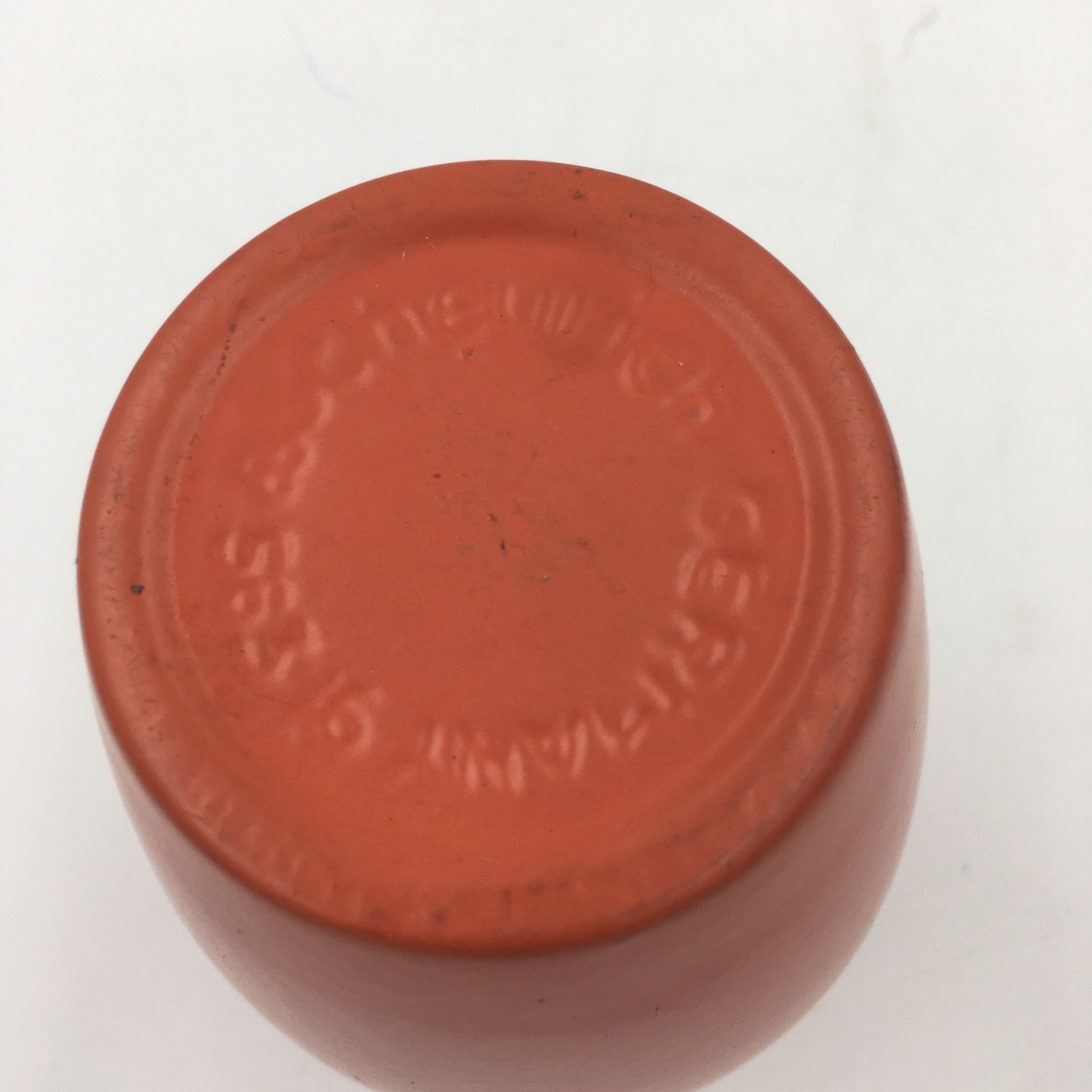 Orange ceramic vase