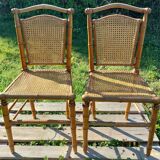 Duo of wooden chairs turned bamboo style