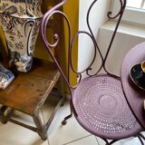 Set of two chairs and wrought iron pedestal table