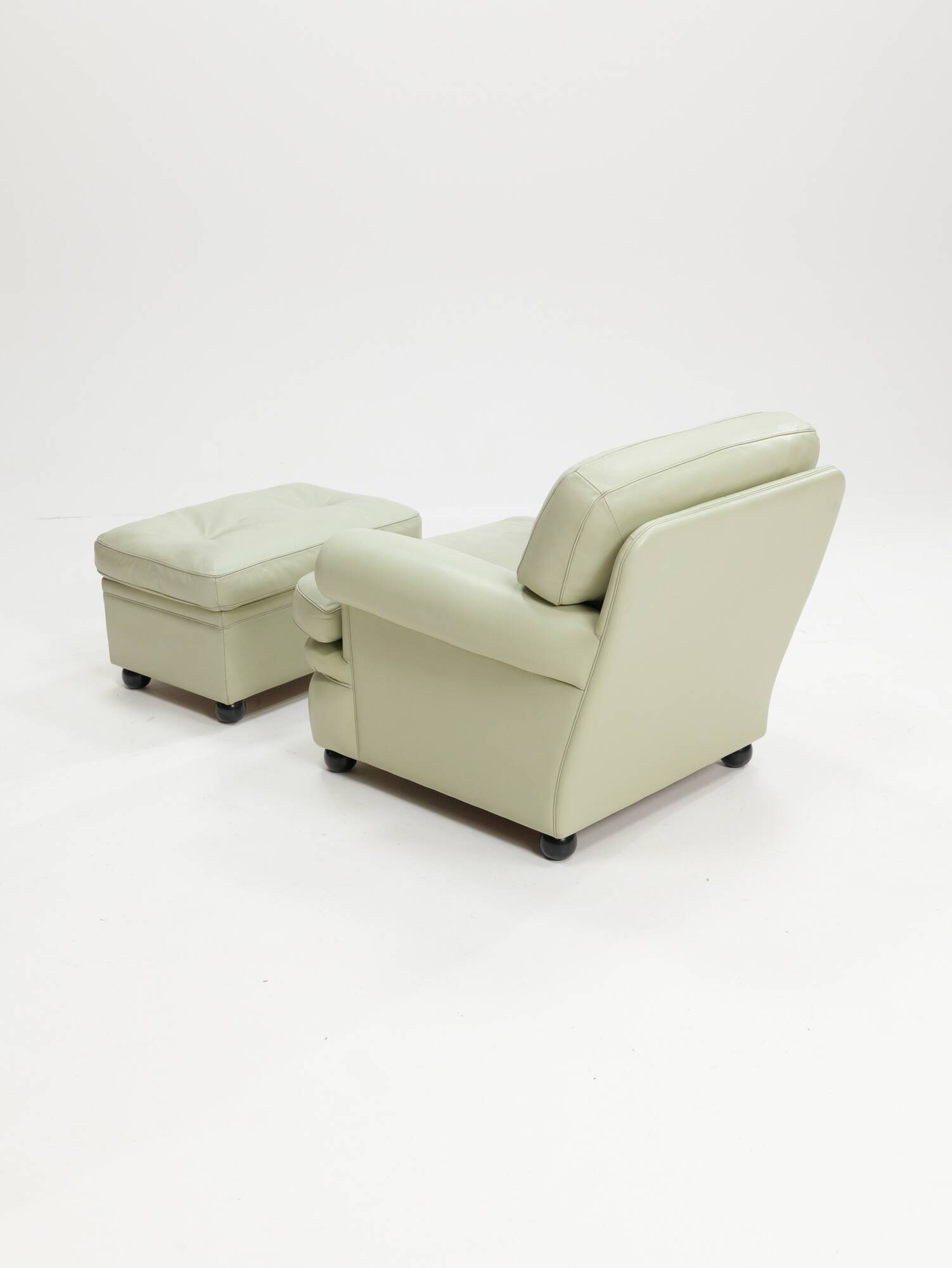 Poltrona Frau 'Dream B' armchair and ottoman, Italy, 1980s