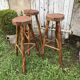 3 bar stools in rough wood