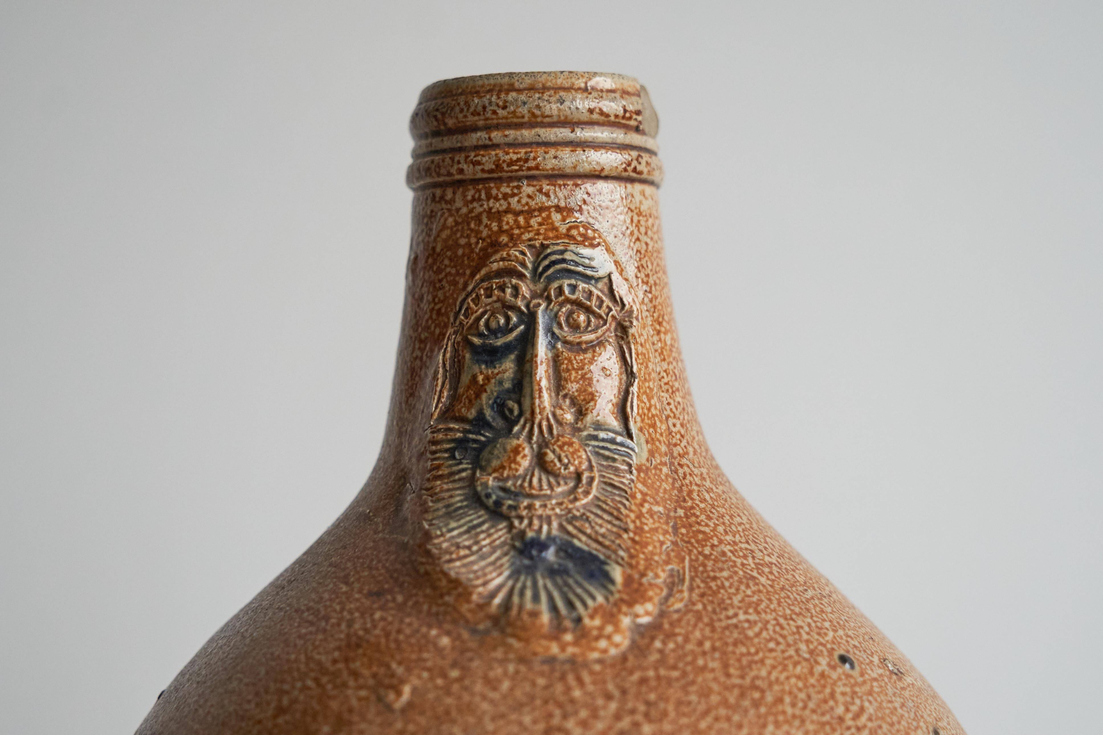 Bartmann jug / Bellarmine 17th century in salt-glazed stoneware