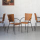 Set of 4 stackable dining chairs in steel and rattan, 1970s