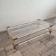 Acrylic glass and brass coffee table, 1985