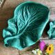 Set of 2 vintage leaf-shaped dishes in majolica.