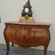 Commode style Louis XV en marqueterie et bois de rose