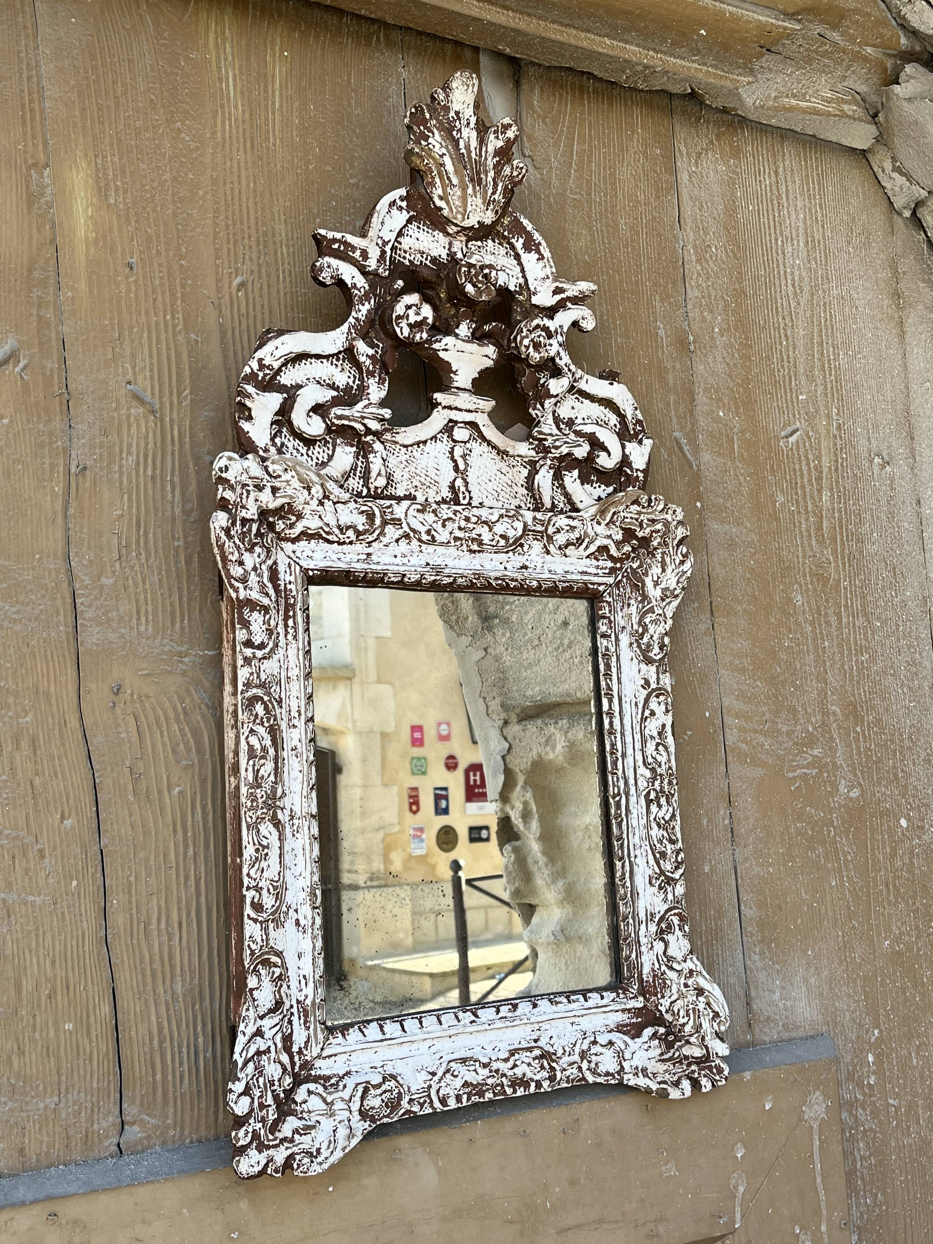 Carved wooden mirror