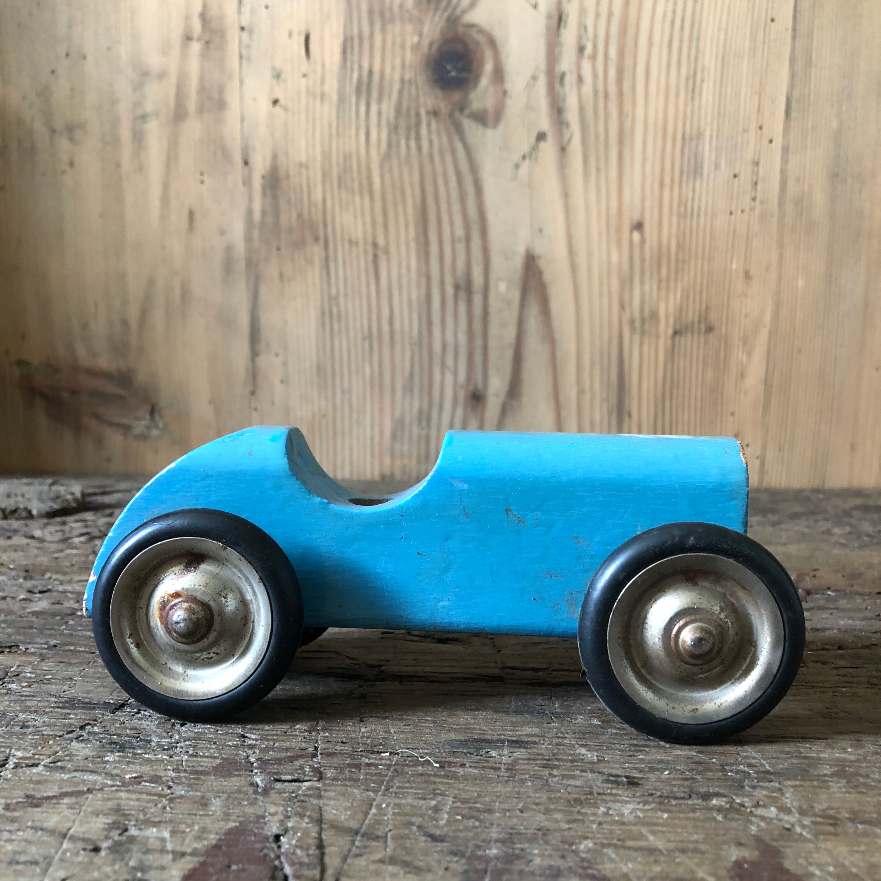 Old painted wooden toy car