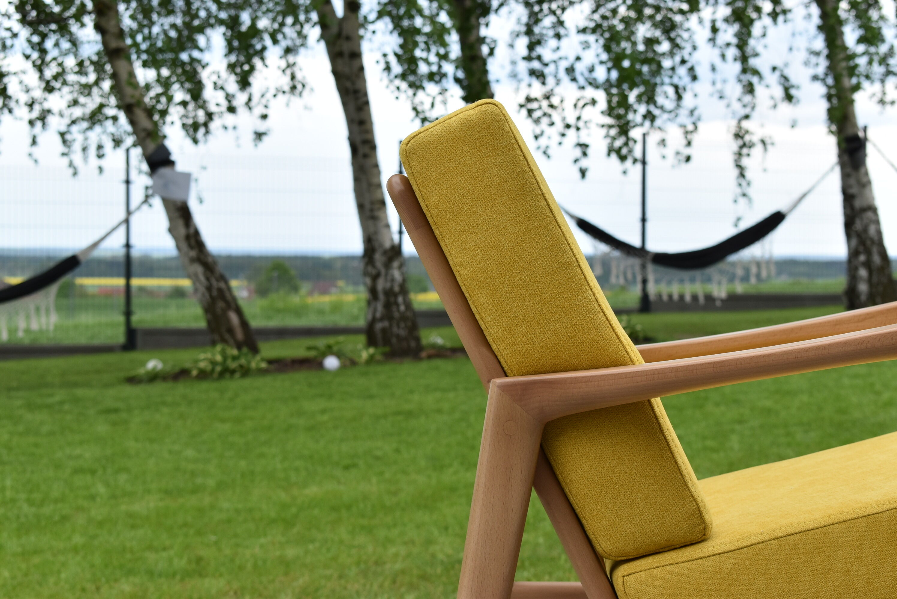 Scandinavian armchair, yellow fabric, natural wood