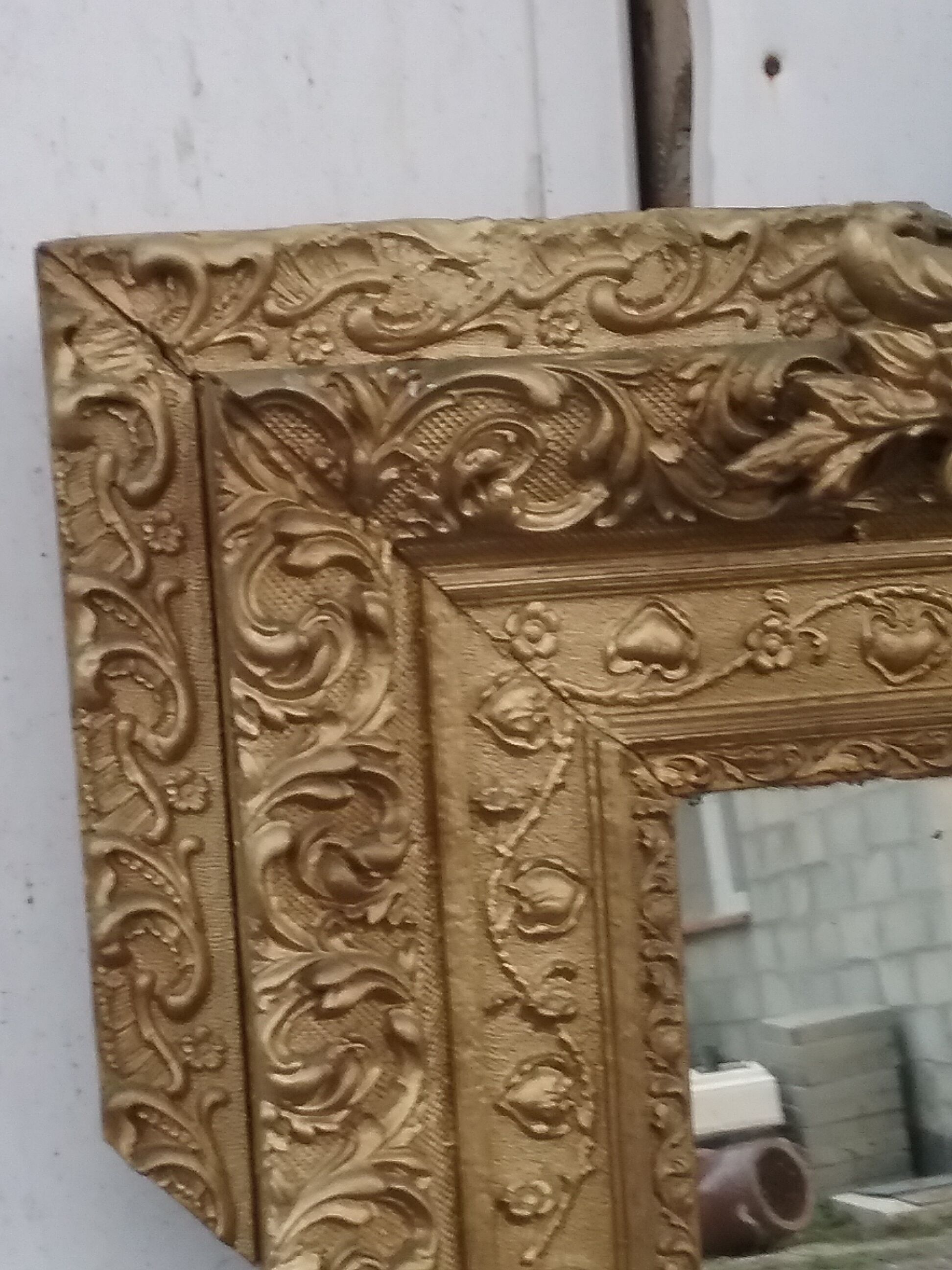 Gilded mirror