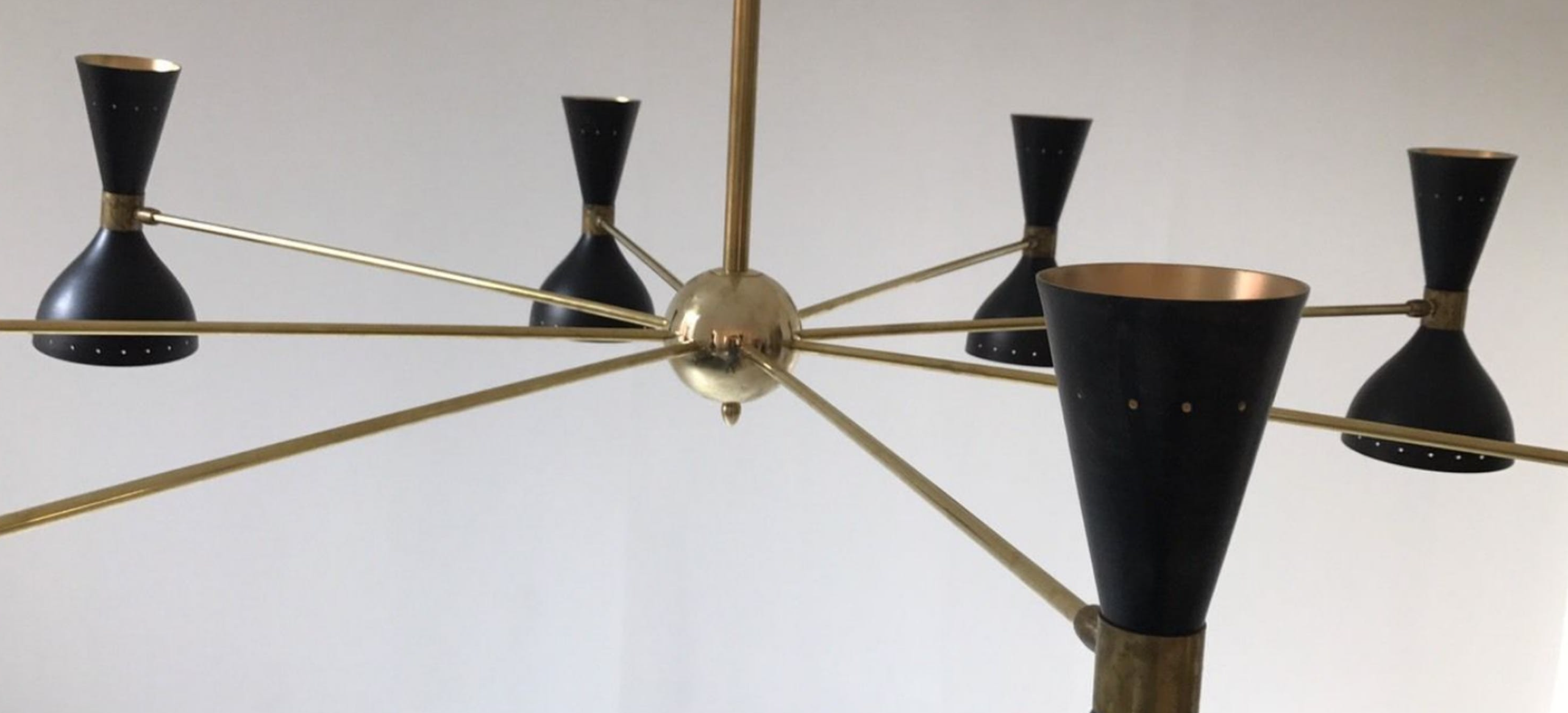 Brass chandelier and black lacquered metal