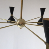 Brass chandelier and black lacquered metal