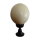 Ostrich egg on blackened wooden base - object of curiosity