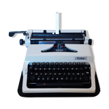 Portable, functional typewriter with user manual