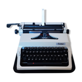 Portable, functional typewriter with user manual