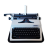 Portable, functional typewriter with user manual