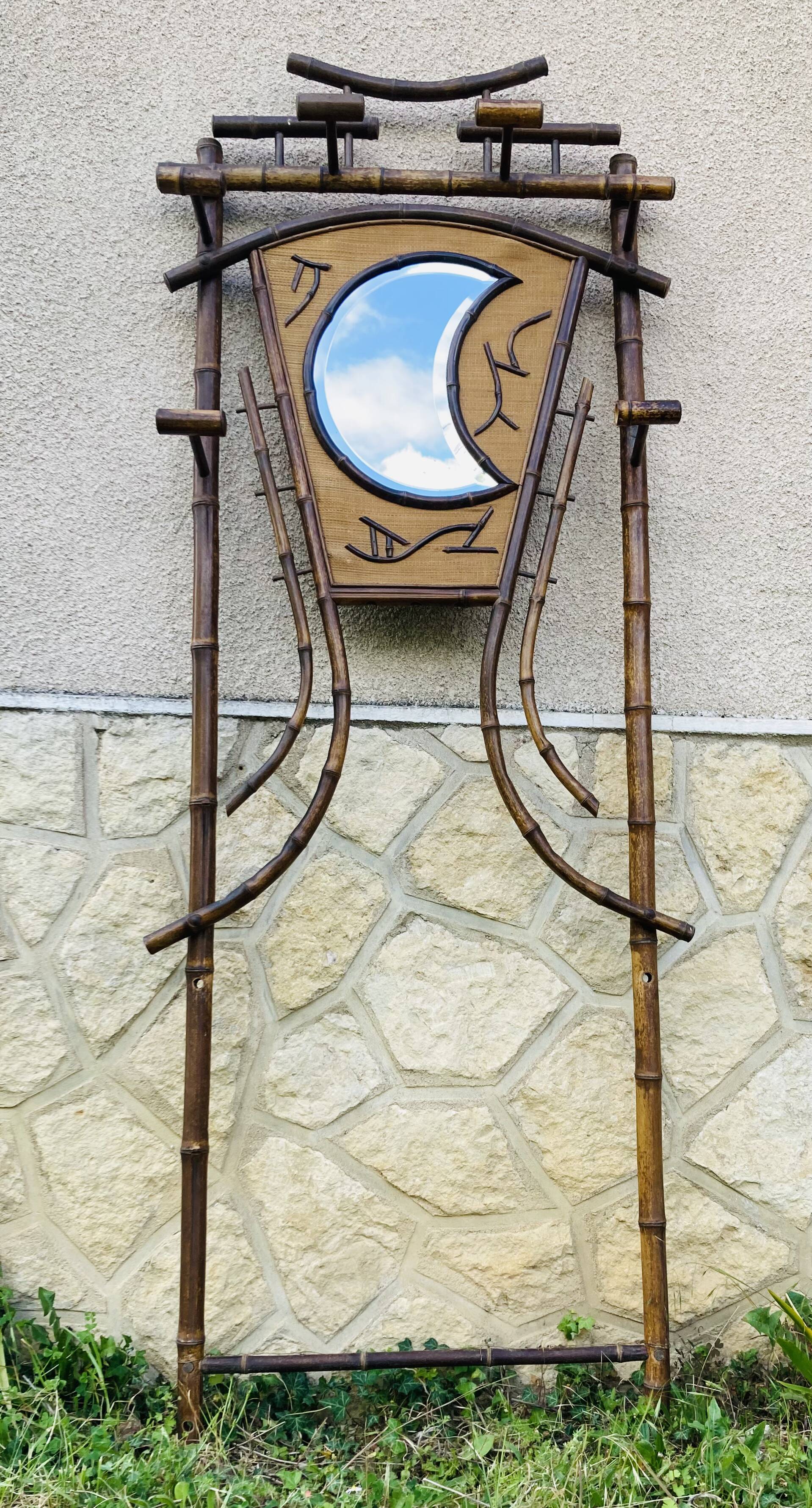 Bamboo coat rack from the 19th century, mirror in the shape of a crescent moon.