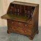 Ancient Georgian writing desk circa 1760 with a leather top.