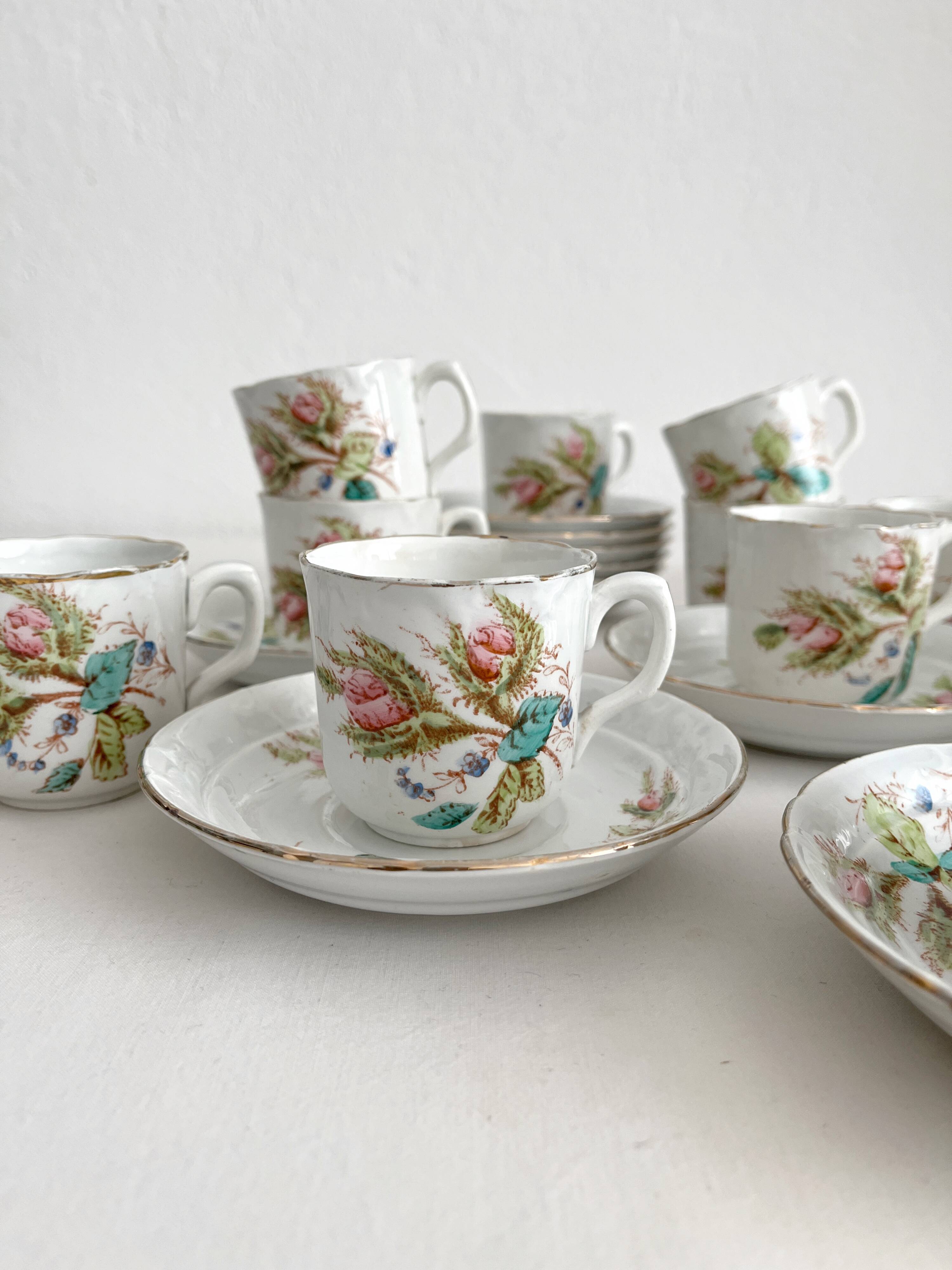 12 ironstone coffee cups with polychrome floral decoration, KG Lunéville